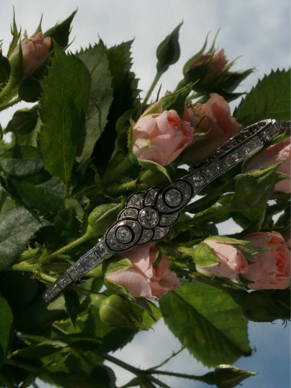 Stylish Art Deco bracelet set with old mine cut diamonds and onyx